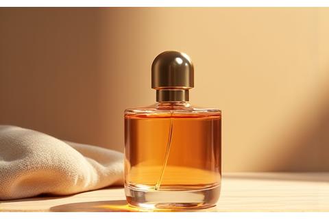An elegant perfume bottle with amber liquid, set against a soft, sun-drenched background of natural elements like wood grain and silk, exuding warmth.
