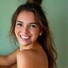 Elara V., glowing with happiness after receiving a perfume gift